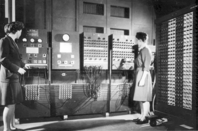 Betty Jennings and Frances Bilas operating ENIAC’s control panels.