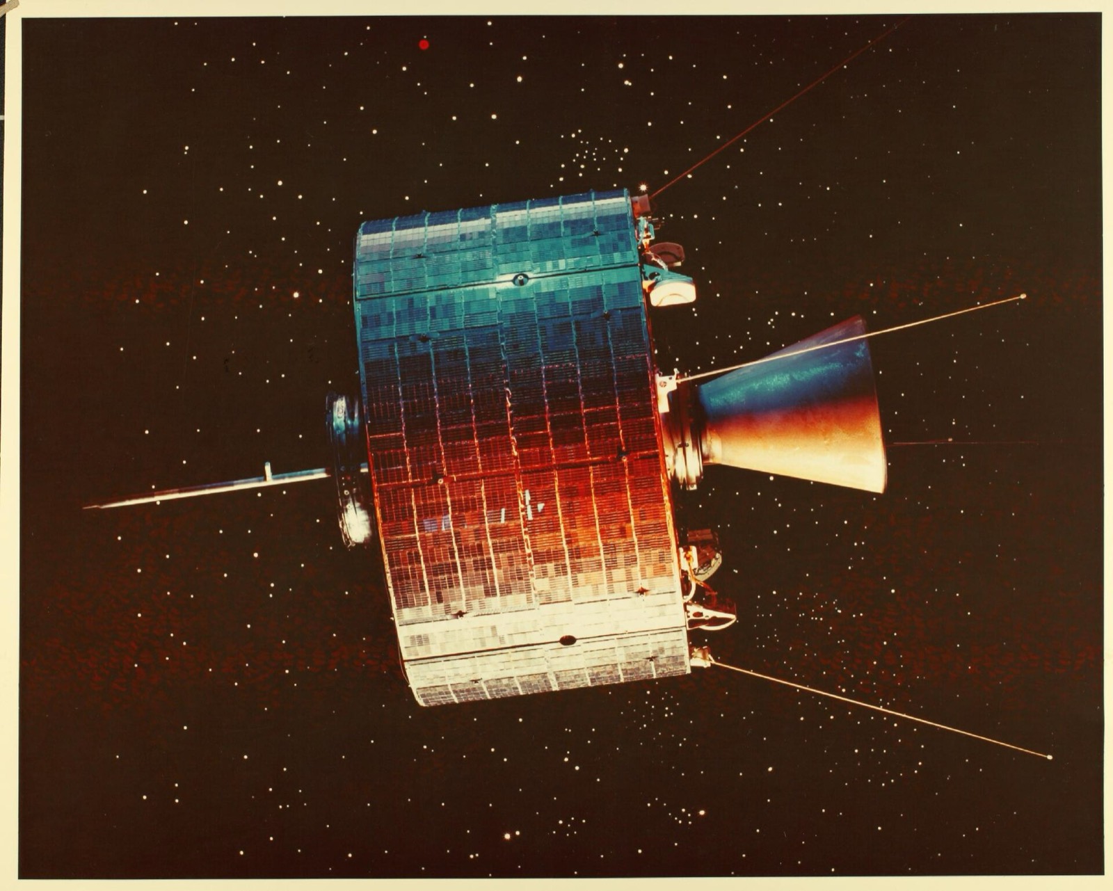 A period image of the Syncom II communications satellite, a drum-shaped body covered in solar cells with antennas, against a starry background.