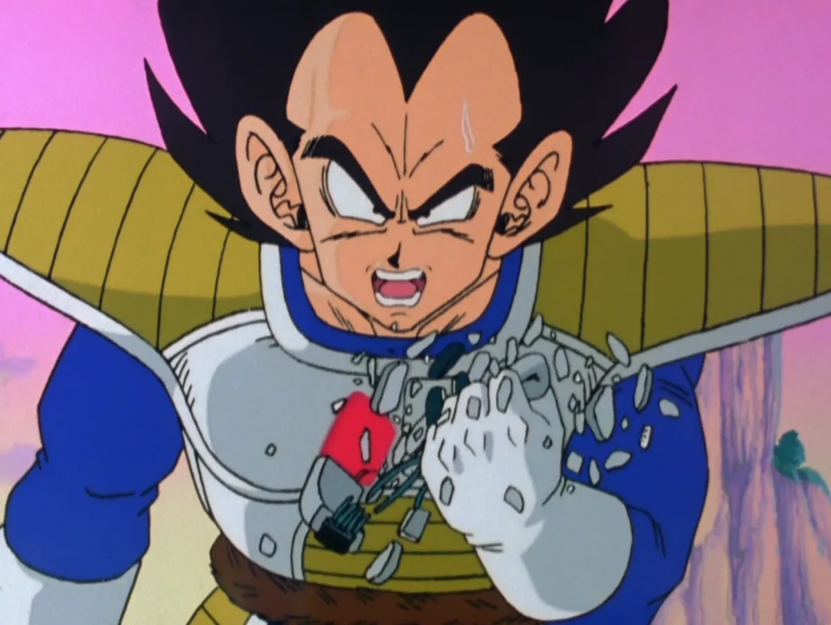 Vegeta from Dragon Ball reacting as his scouter breaks apart.